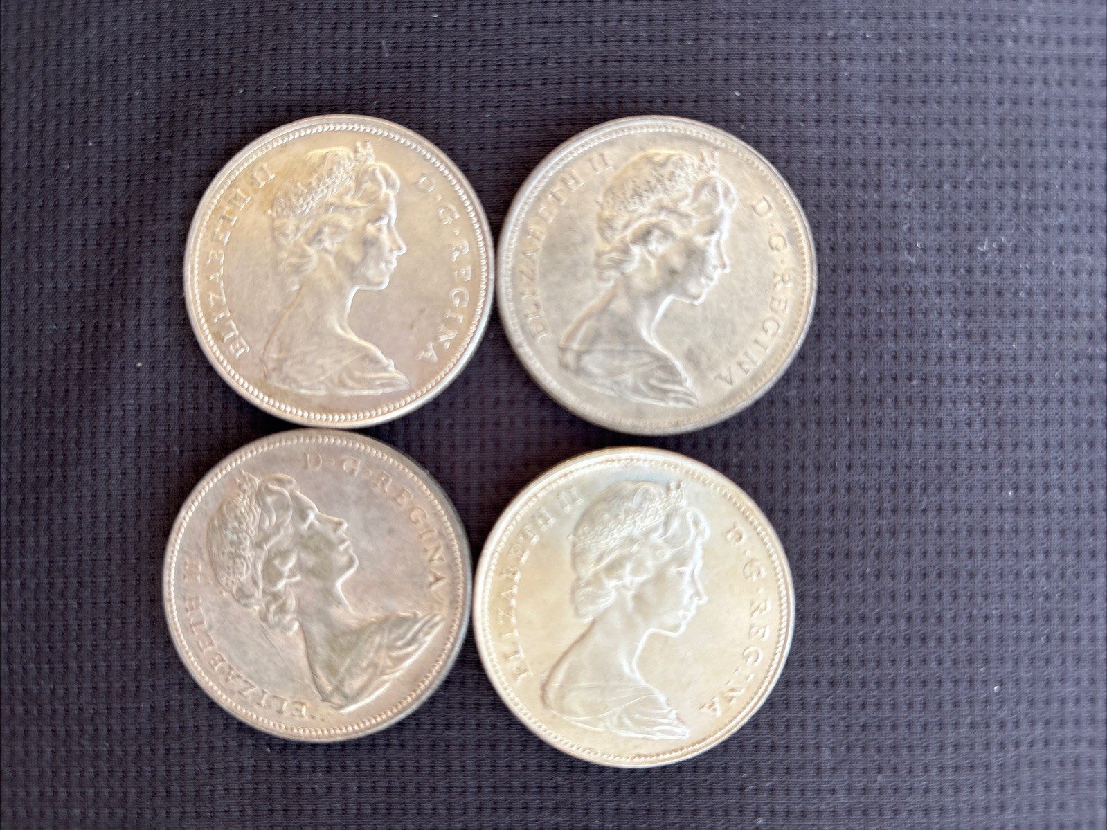 Lot of 4 Canadian Silver Dollars