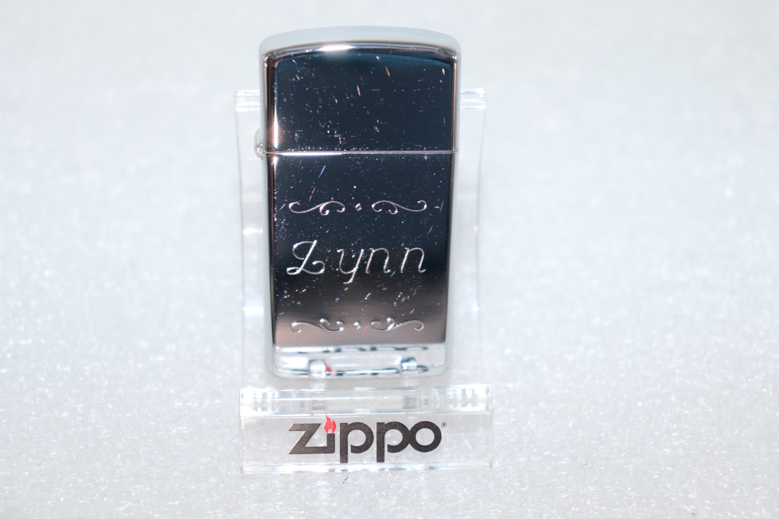 2000 ZIPPO Slim Lighter Unfired High Polish with  " Lynn " Engraving Unfired