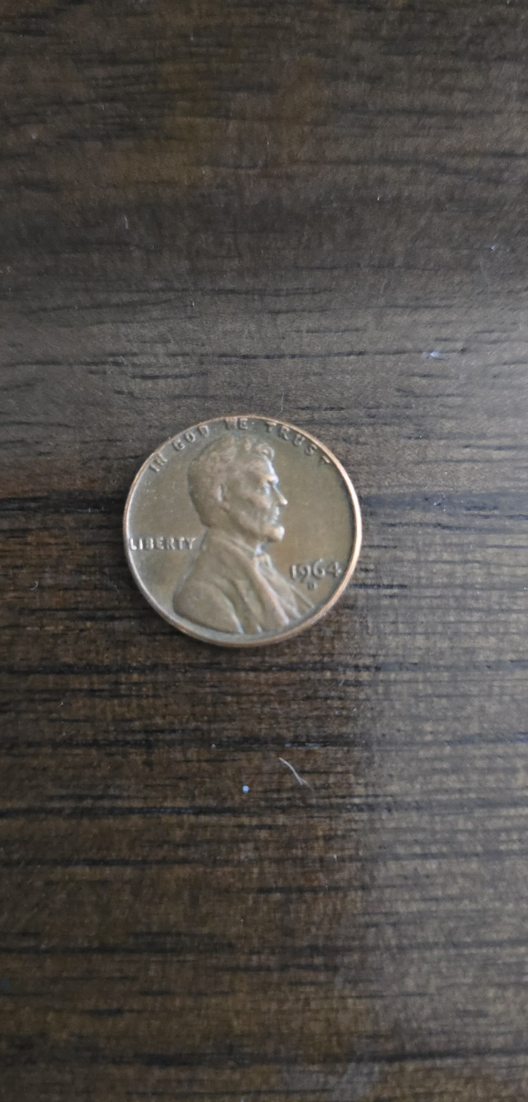 1964 D Lincoln penny "Liberty" on edge and "In god we trust" on edge. Ungraded