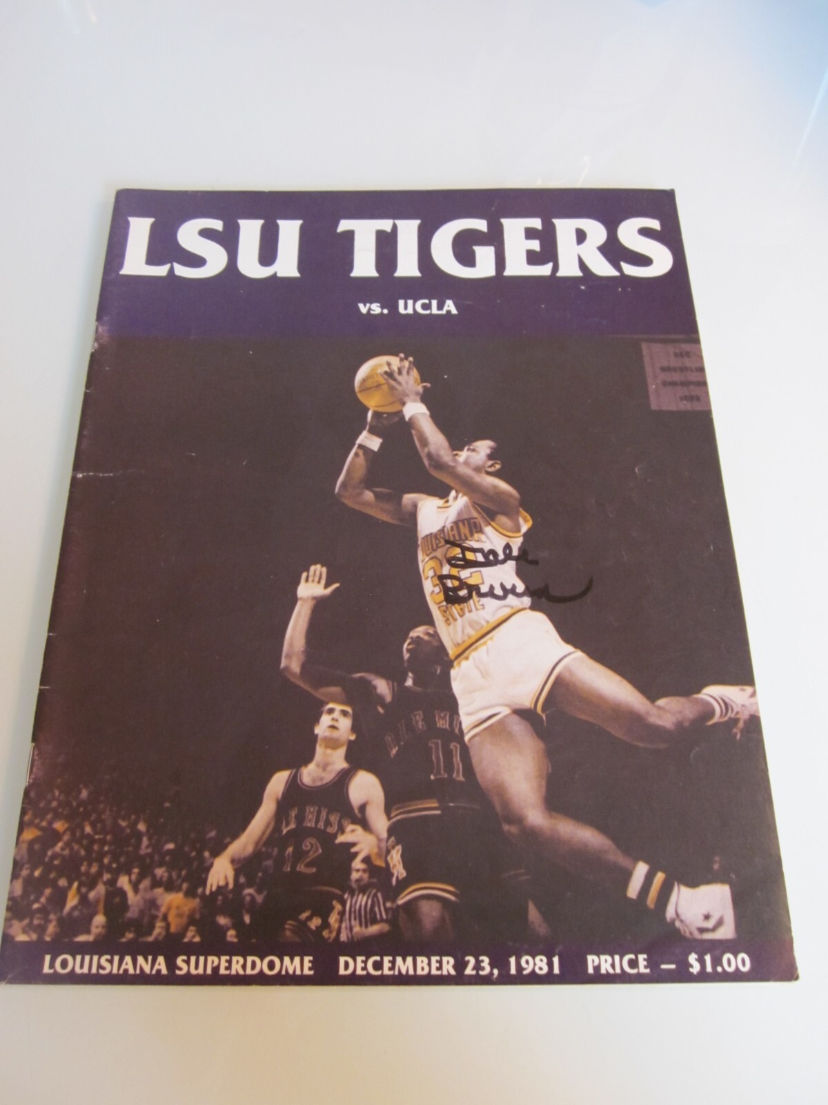 1981 LSU UCLA BASKETBALL PROGRAM SUPERDOME SIGNED BY DALE BROWN