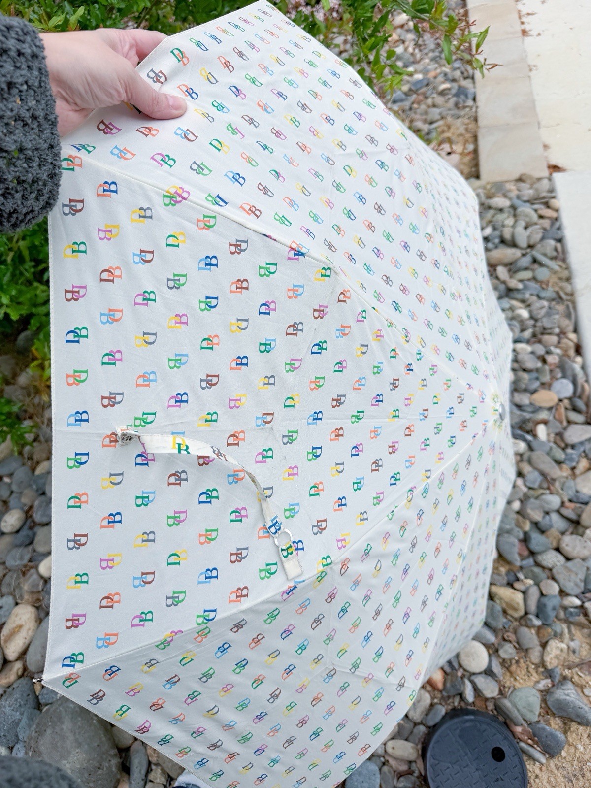 Dooney & Bourke umbrella with a repeating DB logo print Colorful Automatic Open