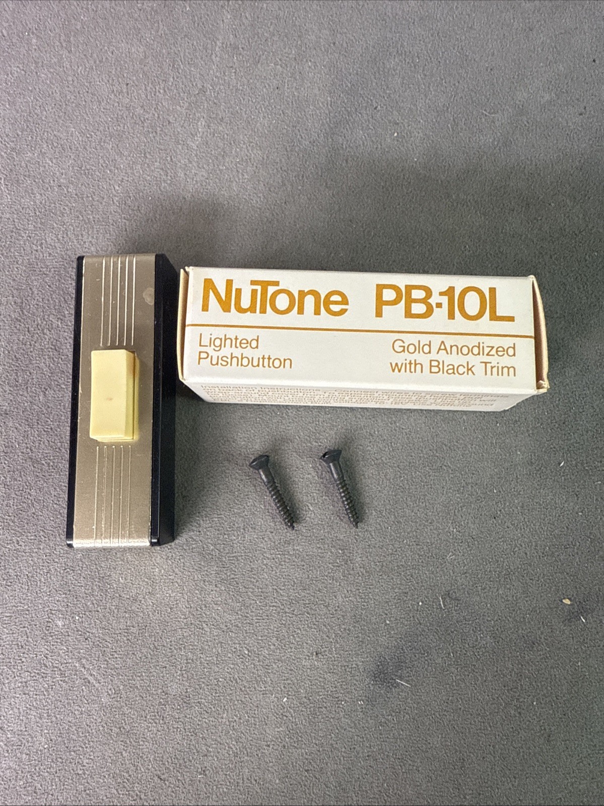 Vintage NOS NuTone PB-10L Gold Anodized W/ Black Trim Lighted Button Doorbell