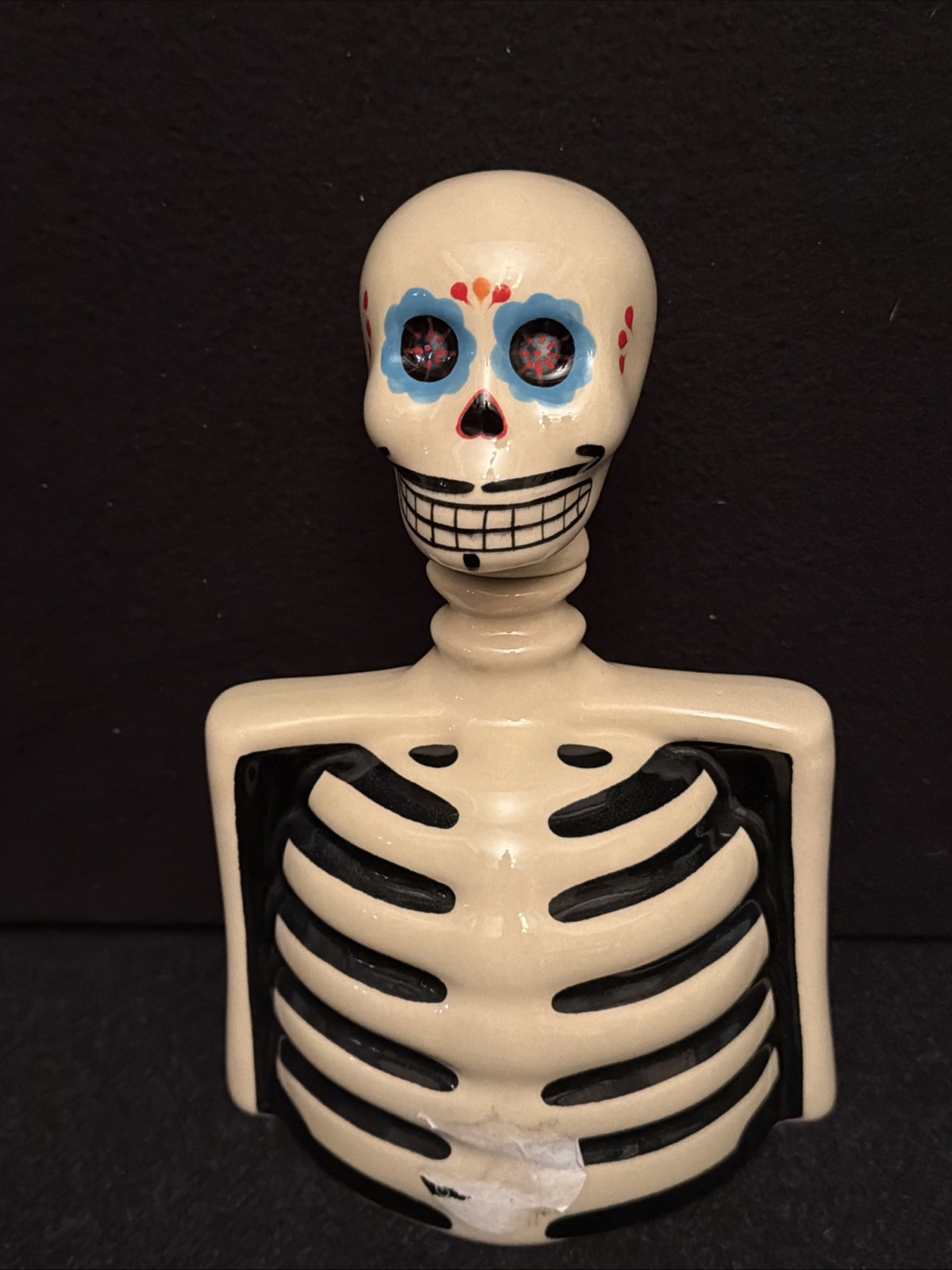 Empty Skelly Azulejos Talavera Head Tequila Bottle.