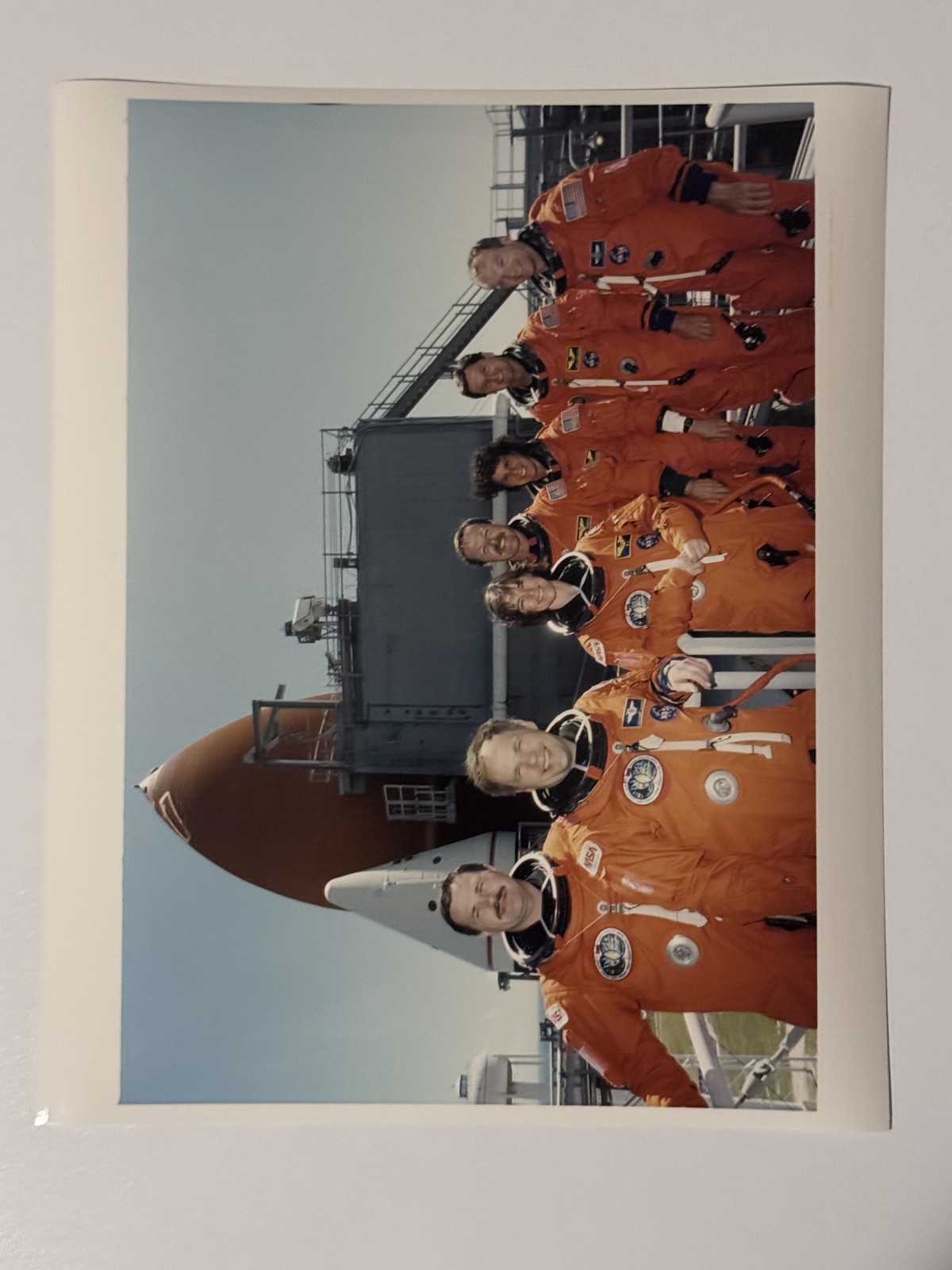 NASA STS-71 Crew Poses Near Fixed Service Structure Press Photo