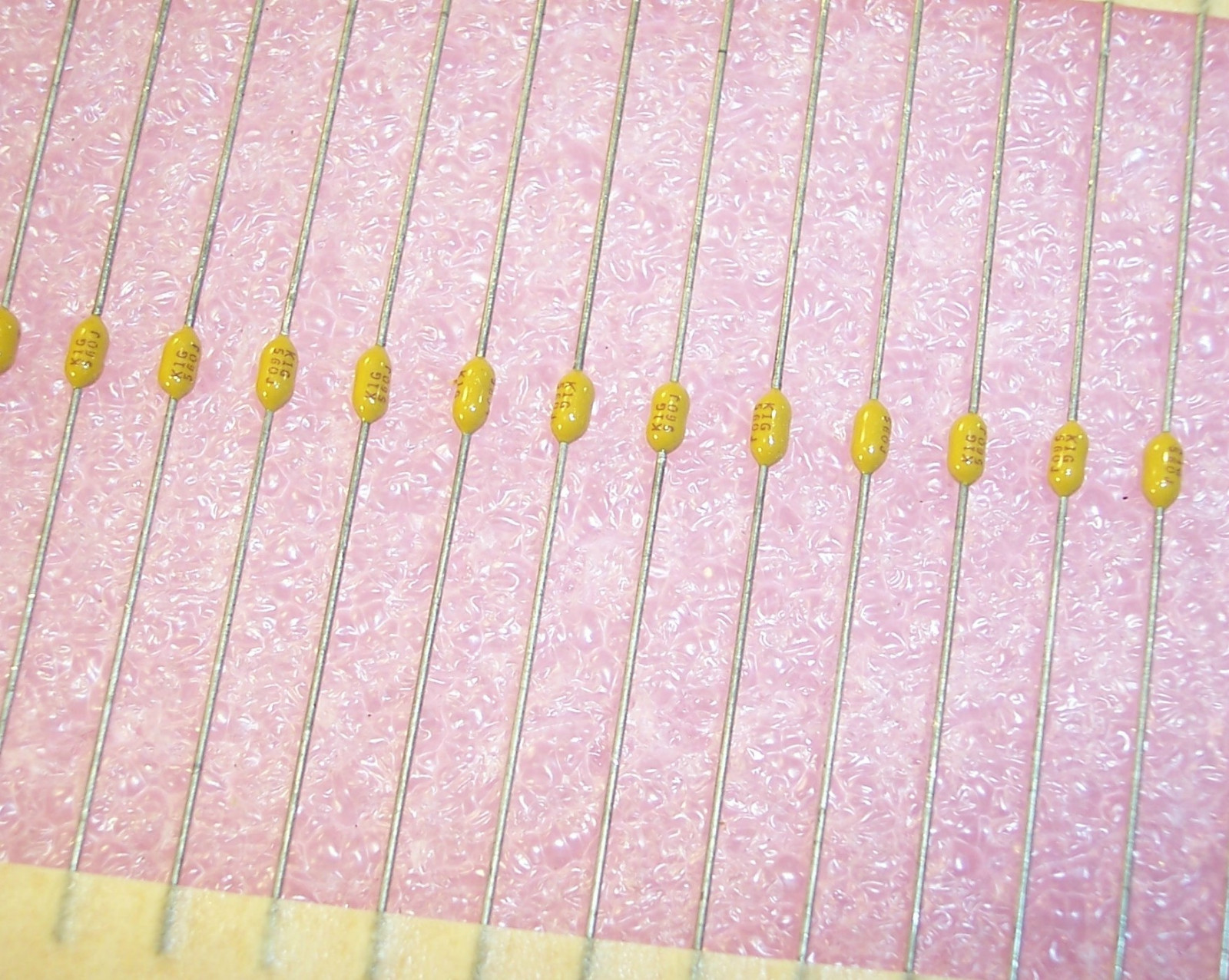 QTY (100) 56pf 100V 5% NPO AXIAL CERAMIC MLCC CAPACITORS C410C560J1G5CA KEMET