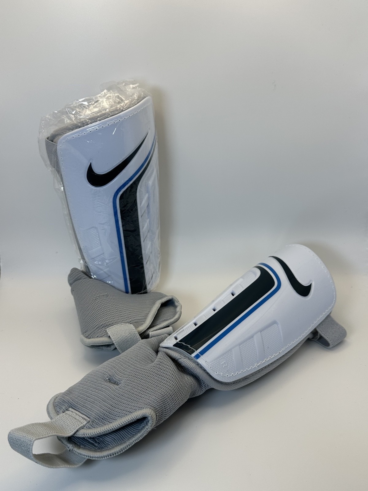 Nike Soccer Shin Guards ALL SIZES – Protective Adjustable Straps, White/Blue