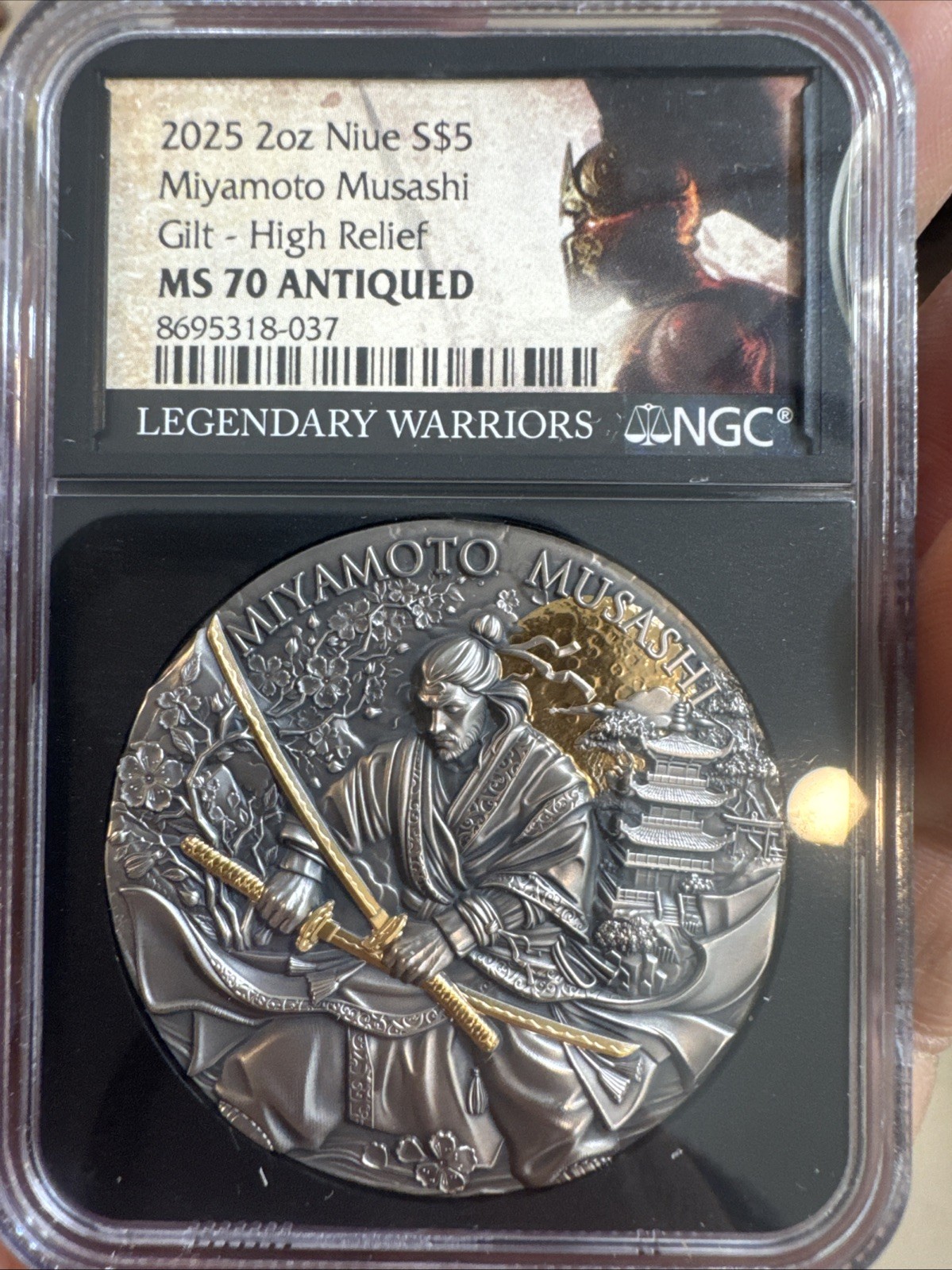 2025 2-oz $5 Miyamoto Musashi High Relief Silver Antiqued &Gold Gilded NGC MS70