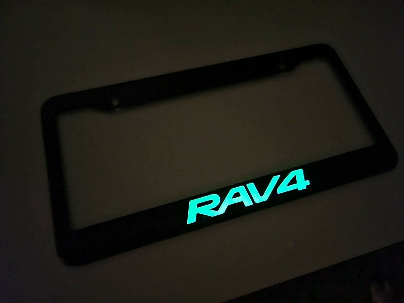 Glowing RAV4 Stainless Steel License Plate Frame Rust Free W/ Bolt Caps