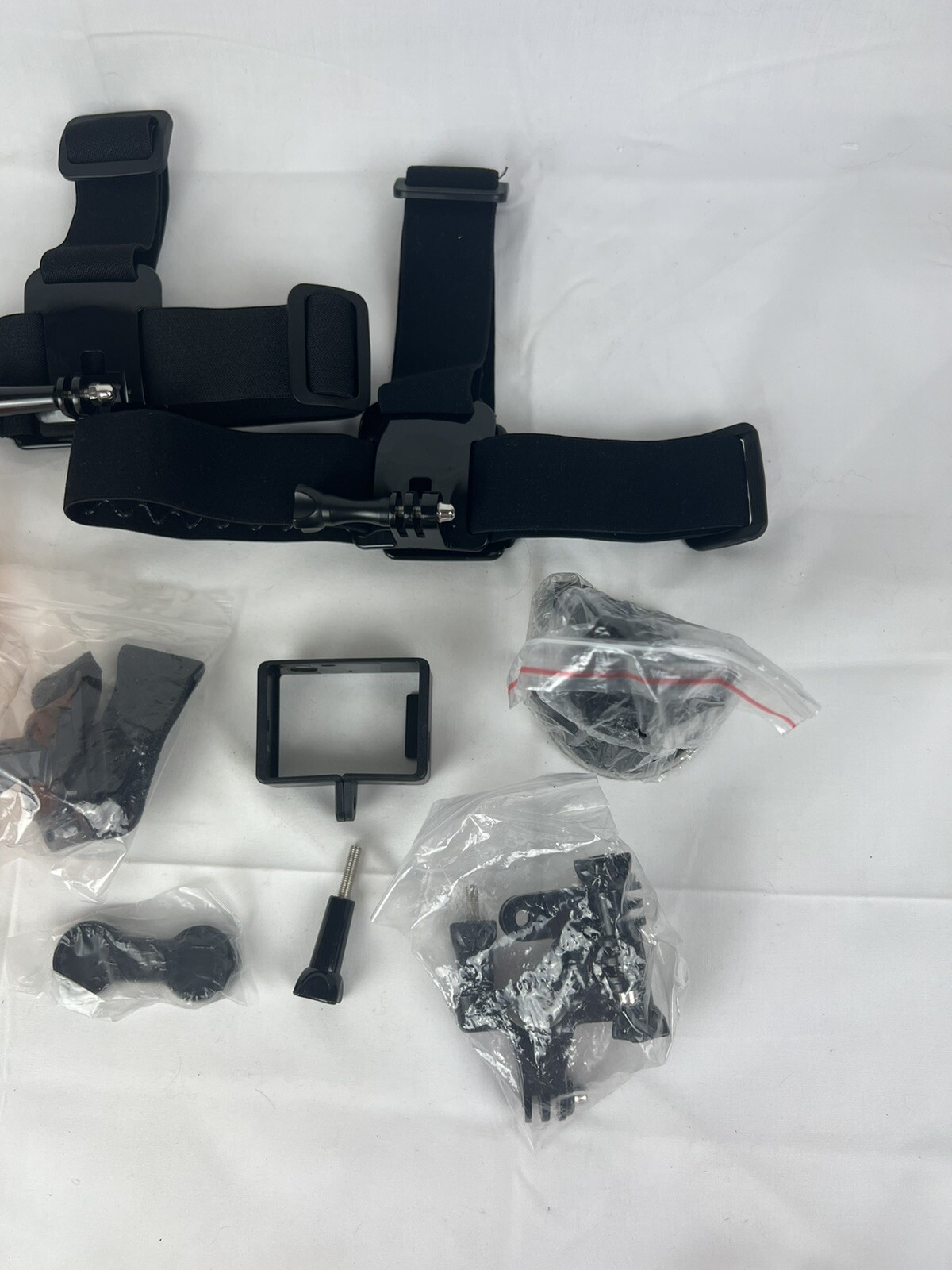 Lot of GoPro Accessories (Head Strap, Joints, Floatable Handle)