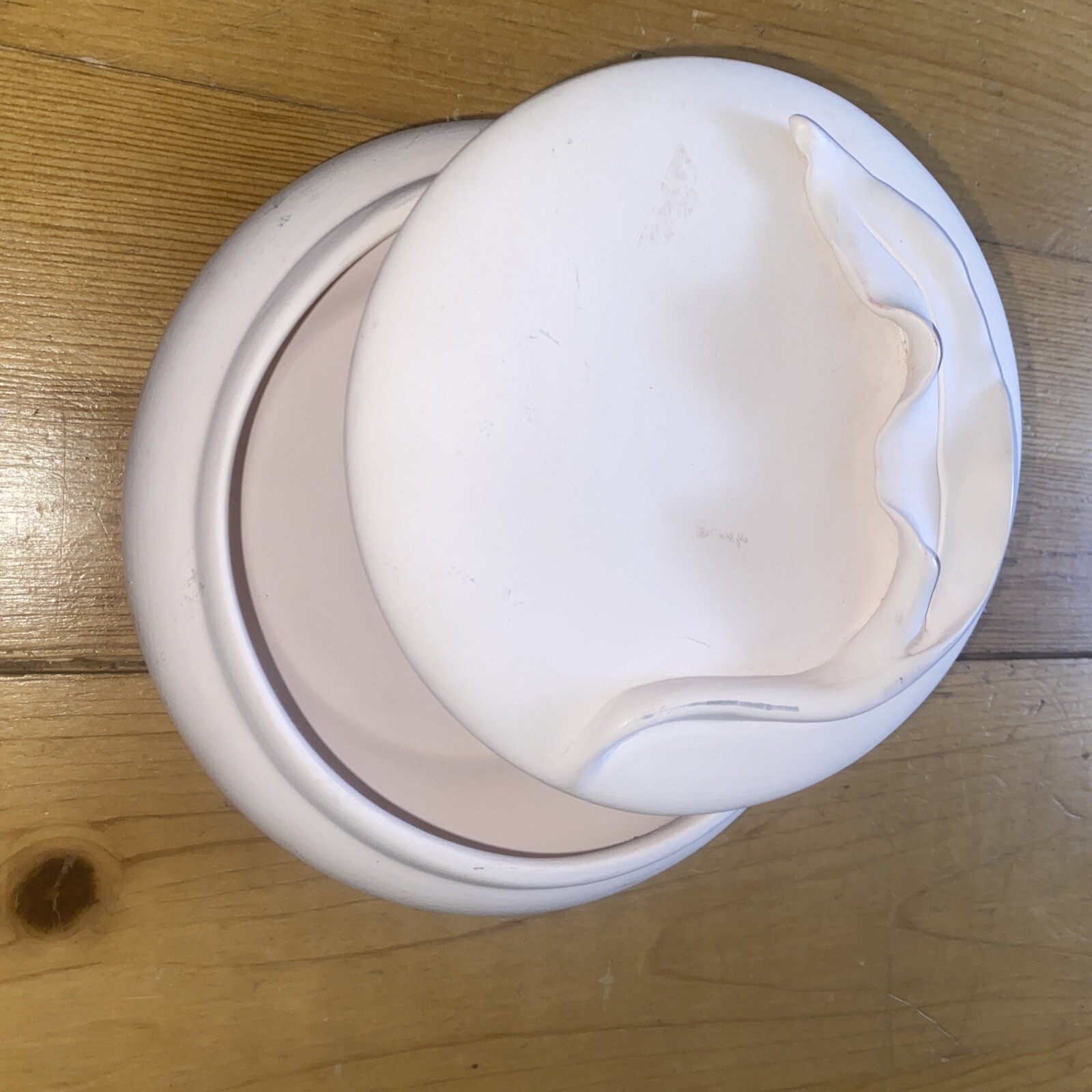 Light pink, signed ceramic covered dish