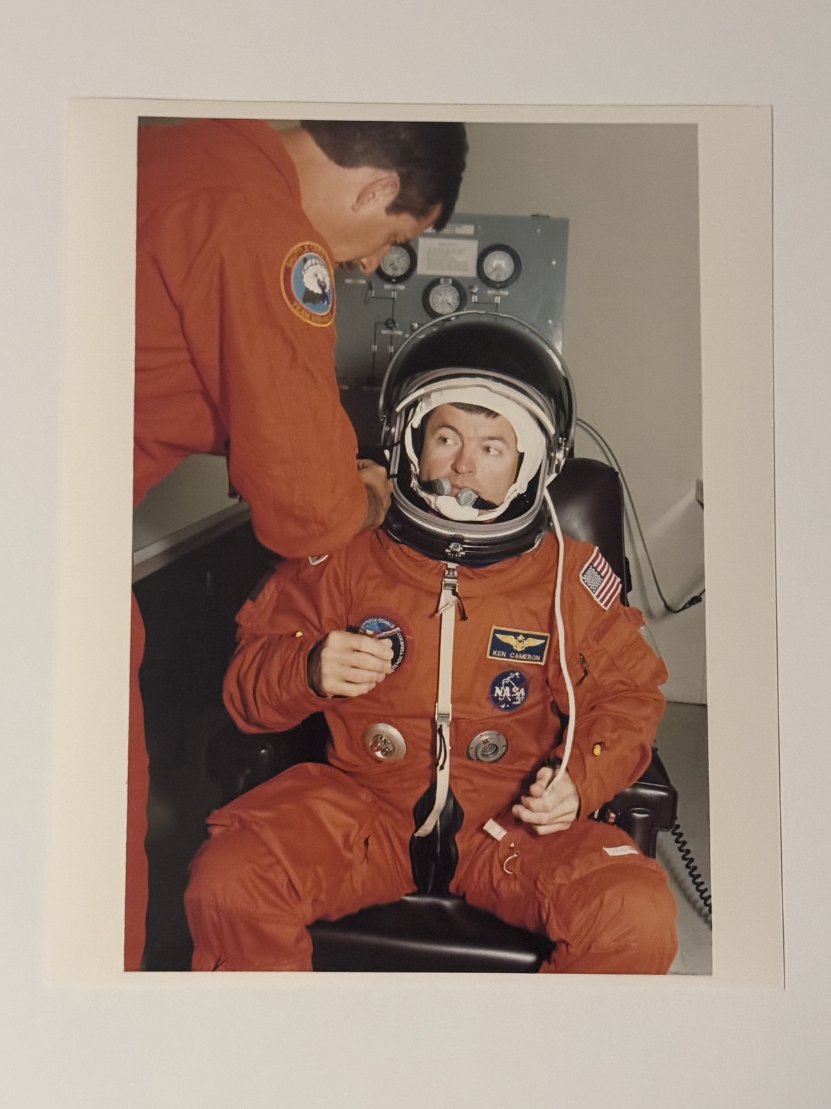 NASA STS-56 Cameron Dons Suit Press Photo