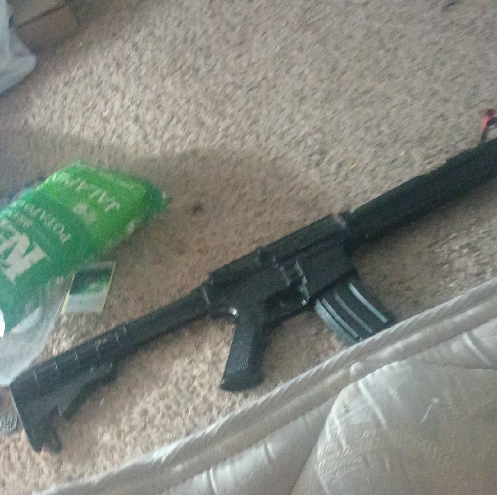 Electric Black Airsoft Rifle with Orange Tip