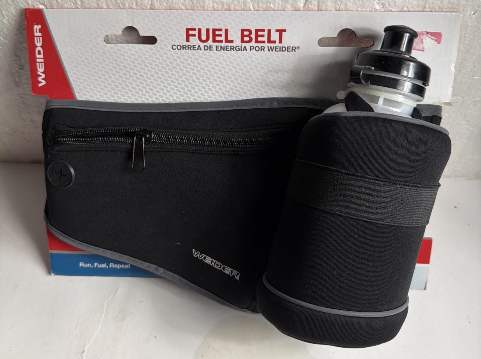 Weider Fuel Belt Hydration Carry Pack Waist. 1 Bottle 16oz. 1 Pocket Elastic