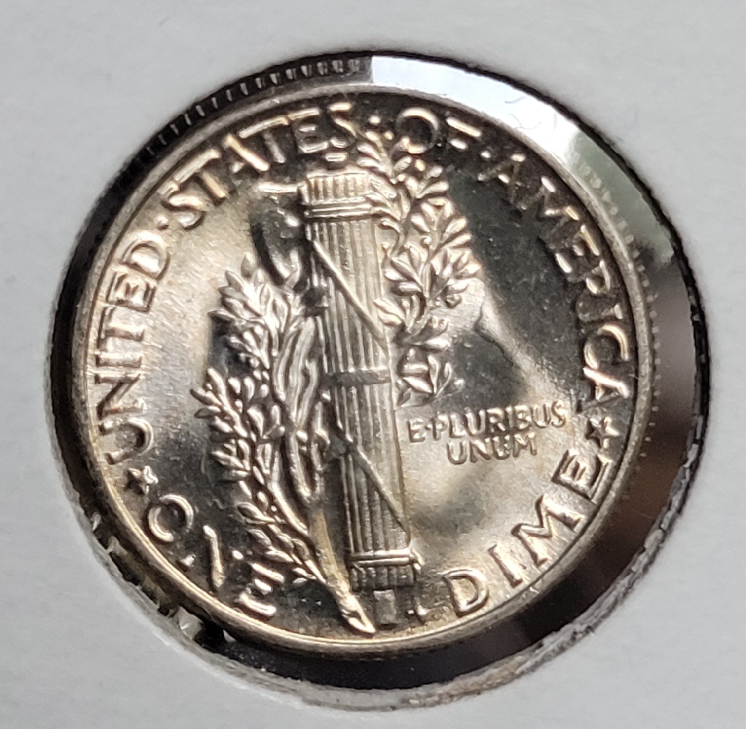1945 Silver Mercury Dime uncirculated light toning on front