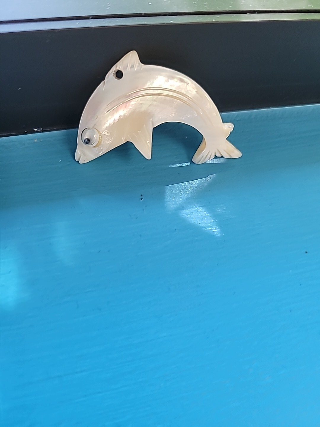 Dolphin Abalone Carved Pearl Opalescent can be worn as a necklace