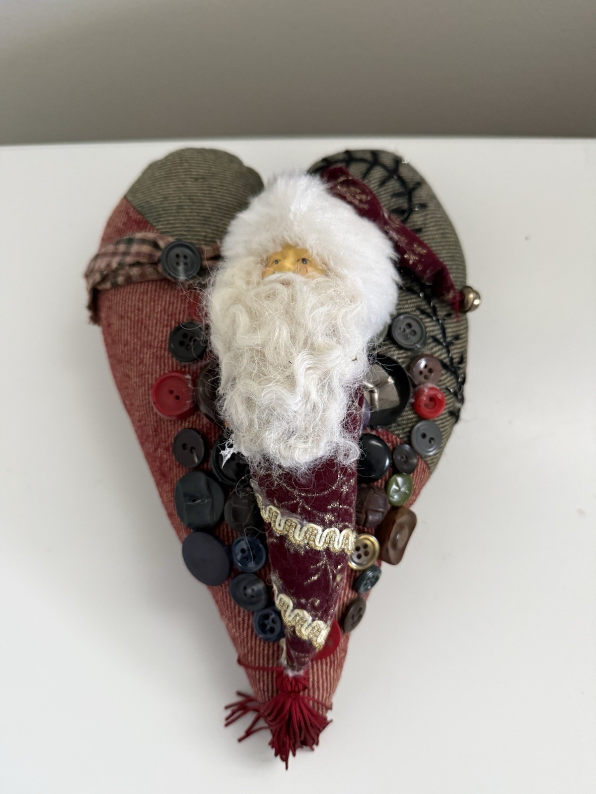 Fabric Stuffed Heart With Santa And Buttons On The Heart