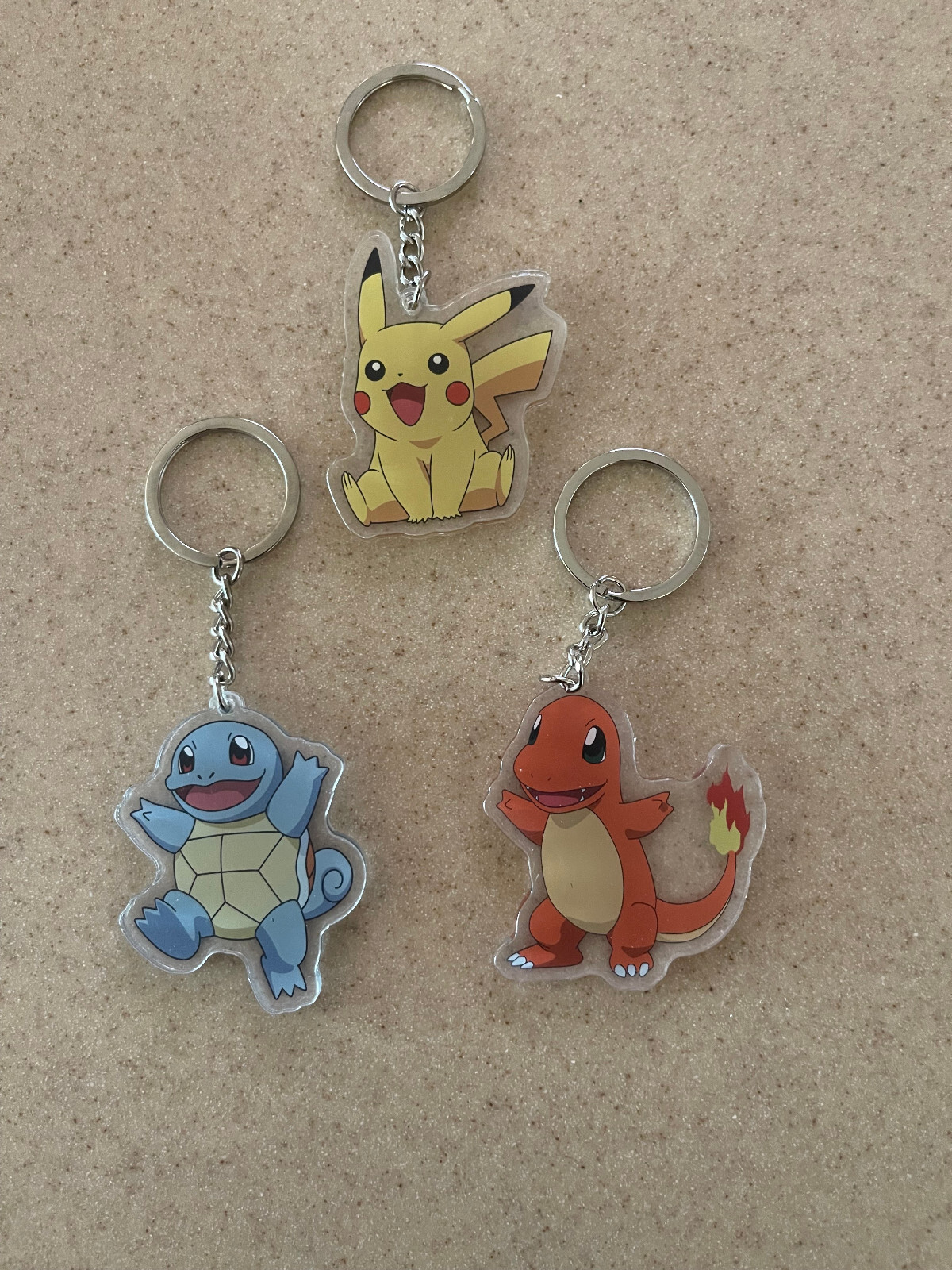 Pokemon Keychain Set Lot of 3 Acrylic Pikachu Charmander Squirtle