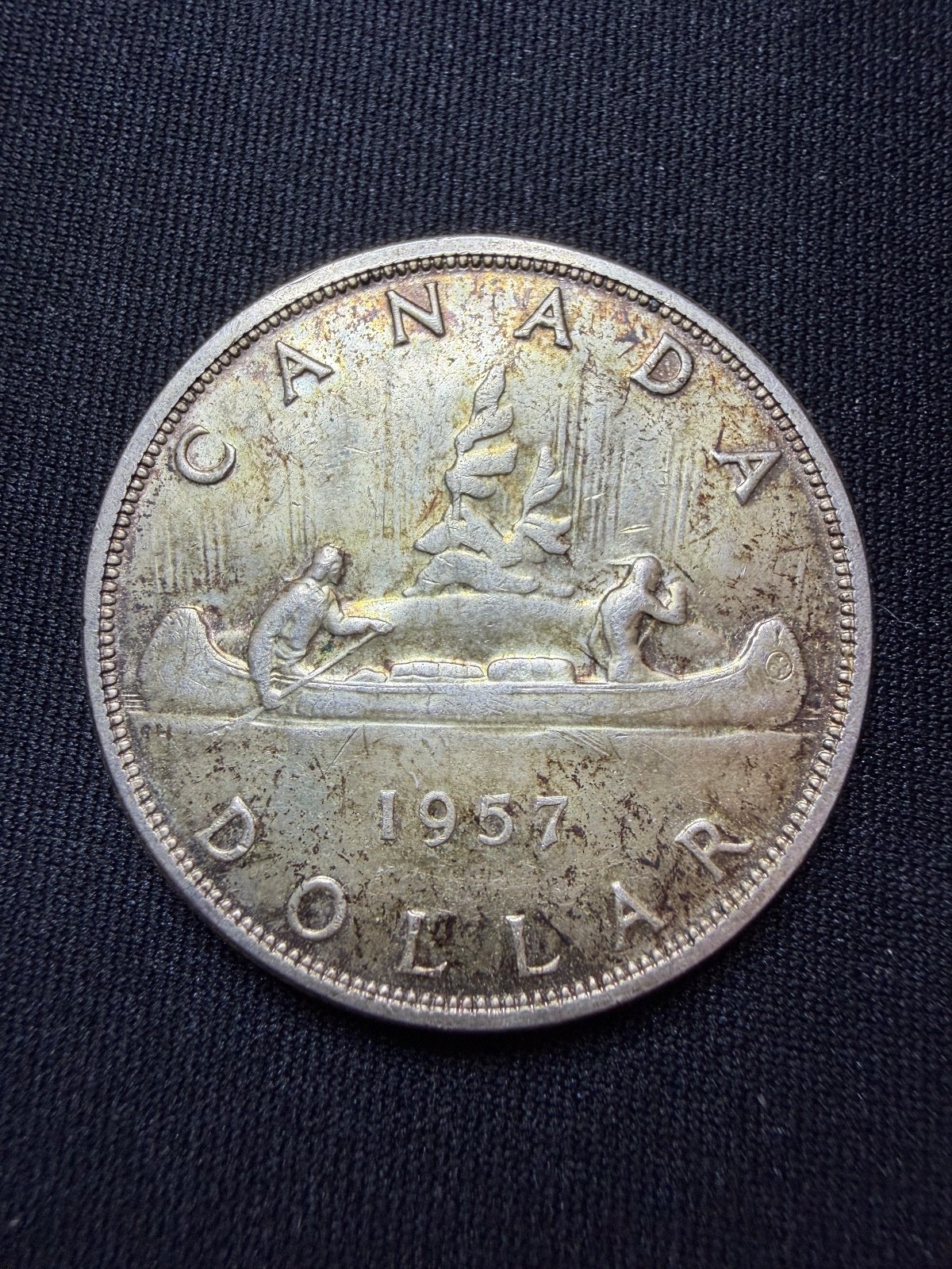 1957 1 waterline Canadian Silver Dollar Coin