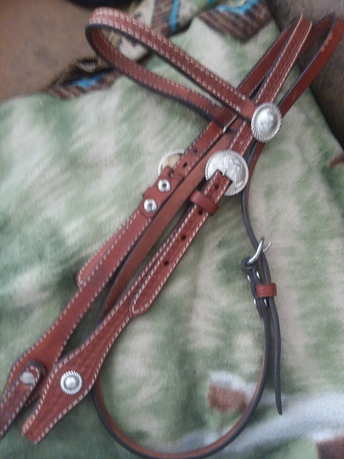 Tooled show bridle with sterling buckles, Fleming conchos & nice correction bit