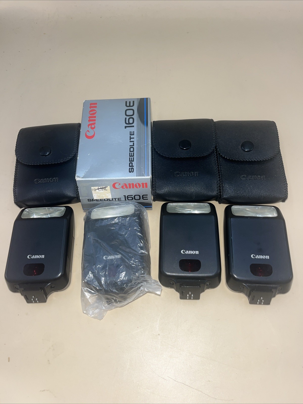 Lot Of 4 160E Speedlite Flashes. NO BATTERIES! Appear Little Used? See Descript