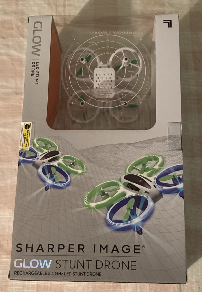 Sharper Image Glow Stunt Drone Rechargable 2.4GHz LED Stunt Drone NEW