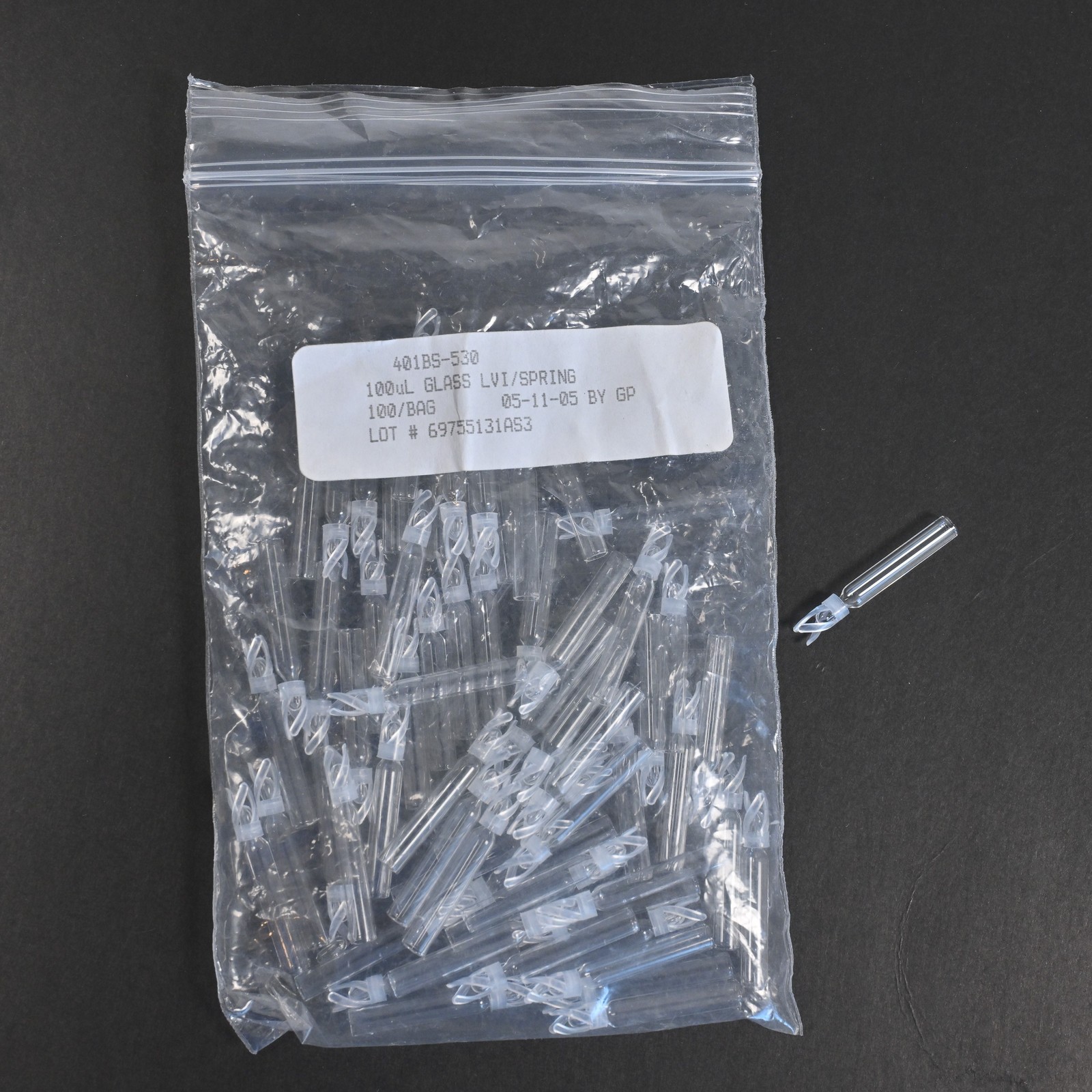 (64) 100µL Capacity, Conical, Bottom Spring 401BS-530 Glass Insert
