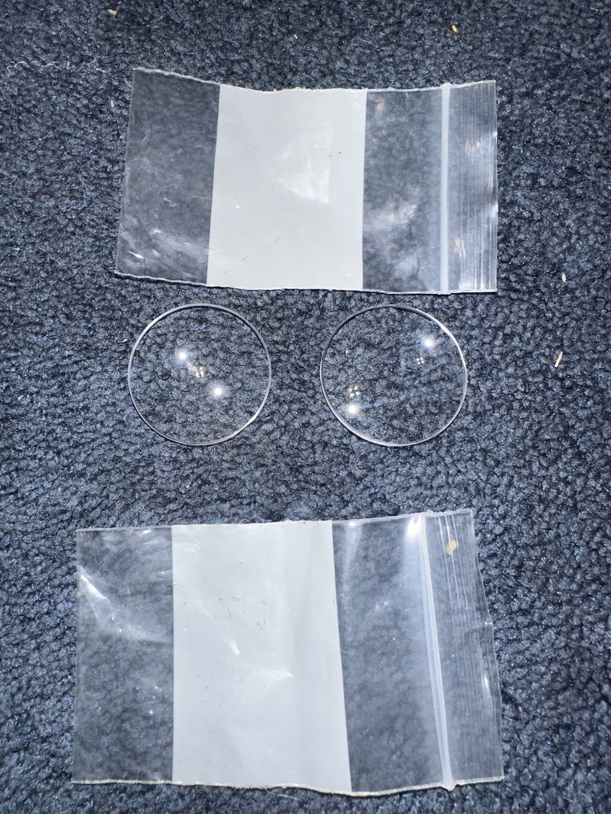2 Nos unknown lenses for Arcade guns. Looks to be about a little over an inch.