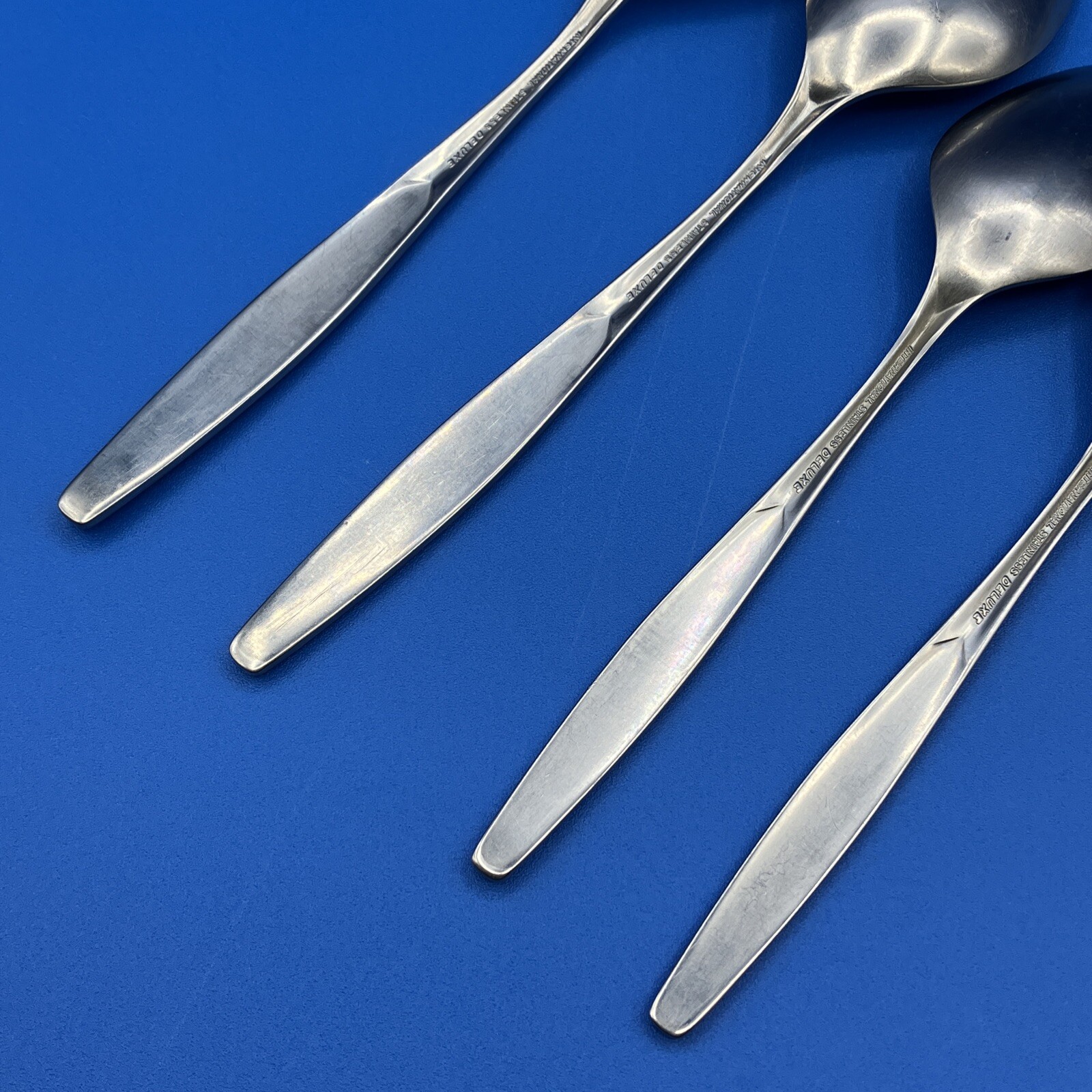 (4)International Deluxe SATURNA Satin Stainless SPOONS Burnished Handle Flatware