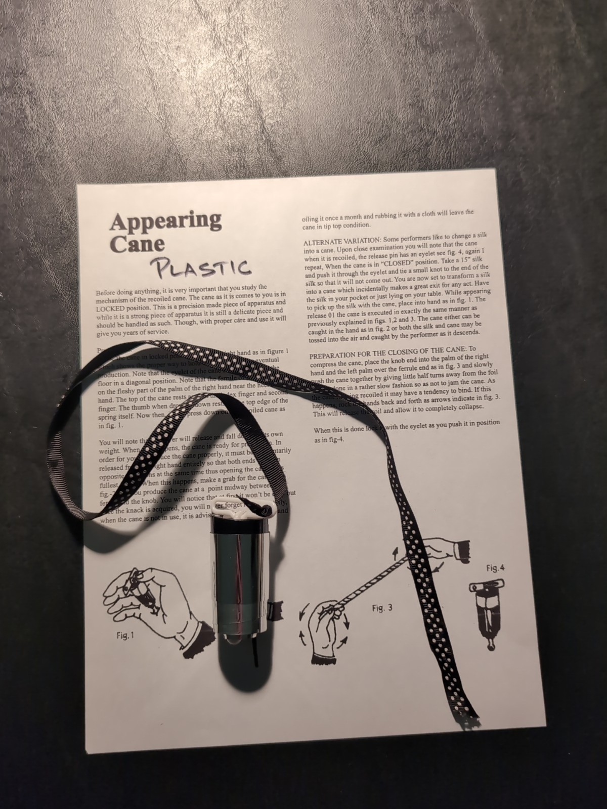 BLACK APPEARING CANE (silver top) - Plastic Magic Trick