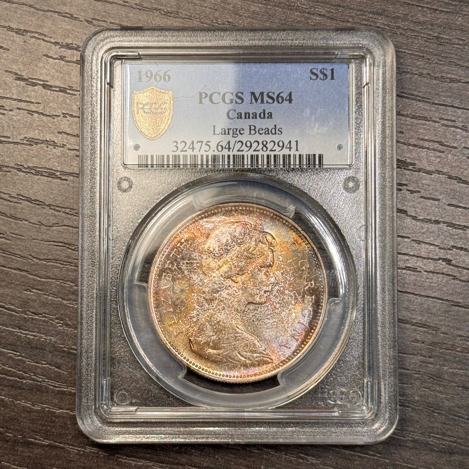 MS64 1966 $1 Canada Voyageur Silver Dollar, PCGS Trueview- Rainbow Toned