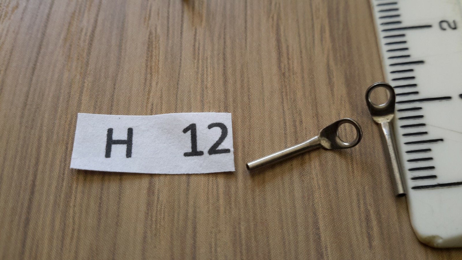 TWO VINTAGE FISHING ROD TIP RING(0.9 mm bore 2mm eye measured using a drill bit)