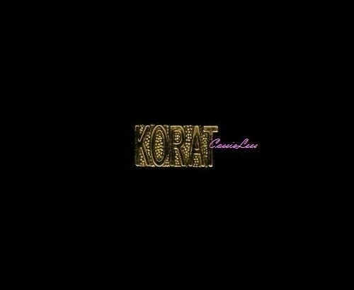 Korat (script)  1" + a custom promo pin