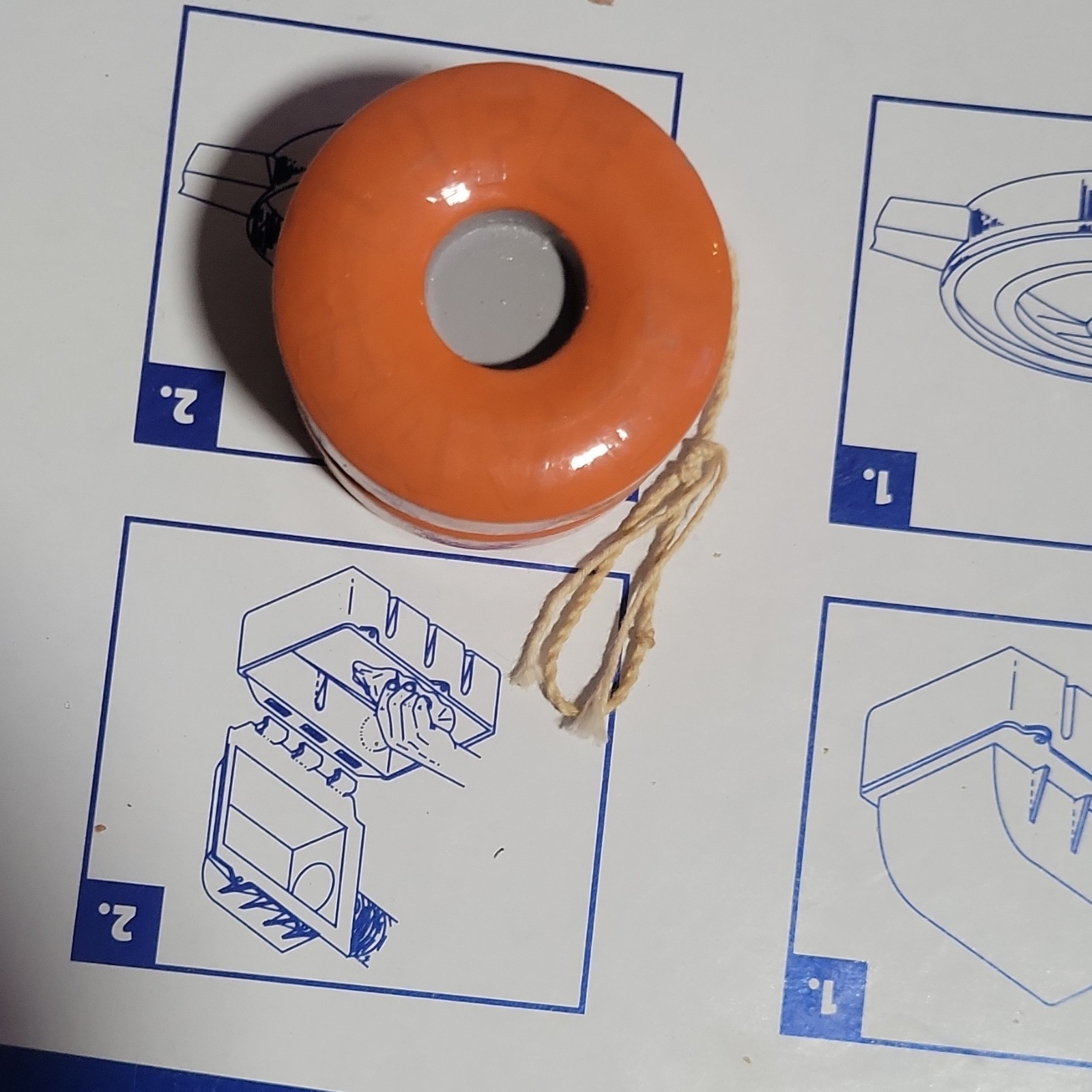 Orange Yo-Yo with Gray Center and String Modern Design