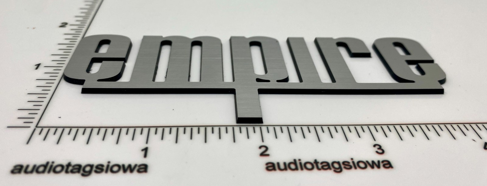 Empire Turntable Logo Badge Custom Incised Acrylic Silver Version