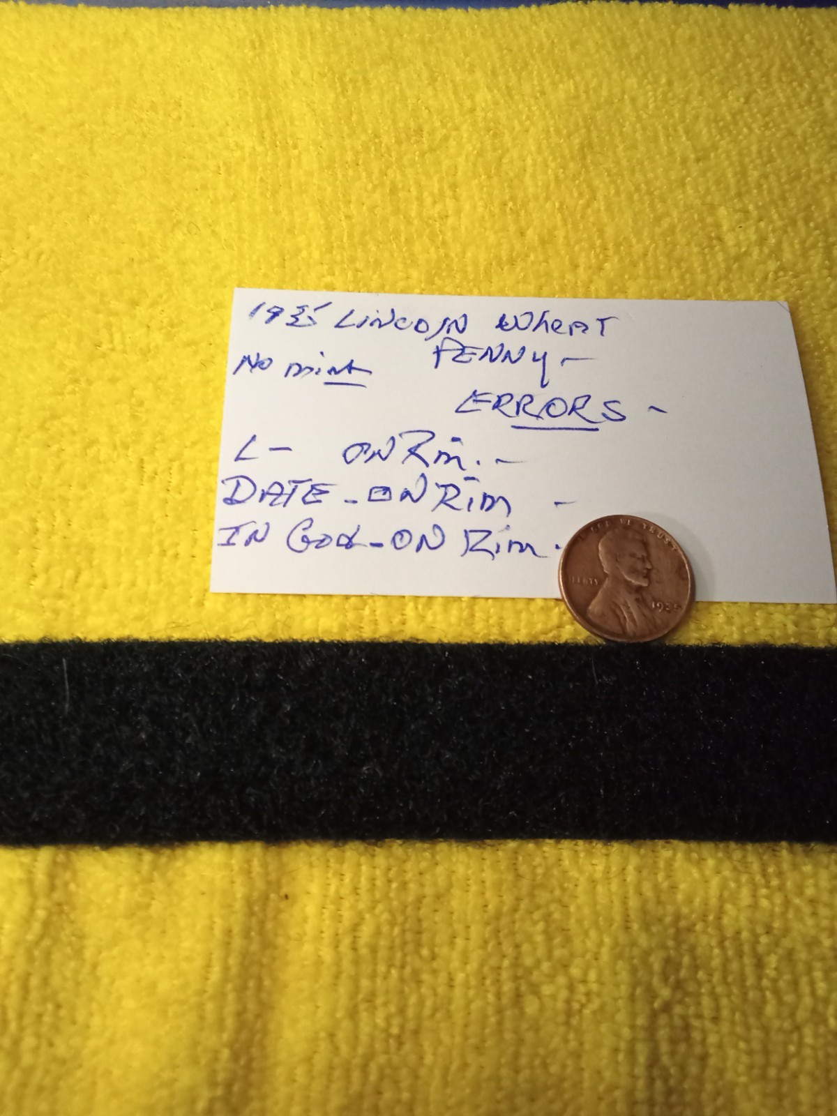 1935 lincoln wheat penny ERROR “L” in Liberty edge error
