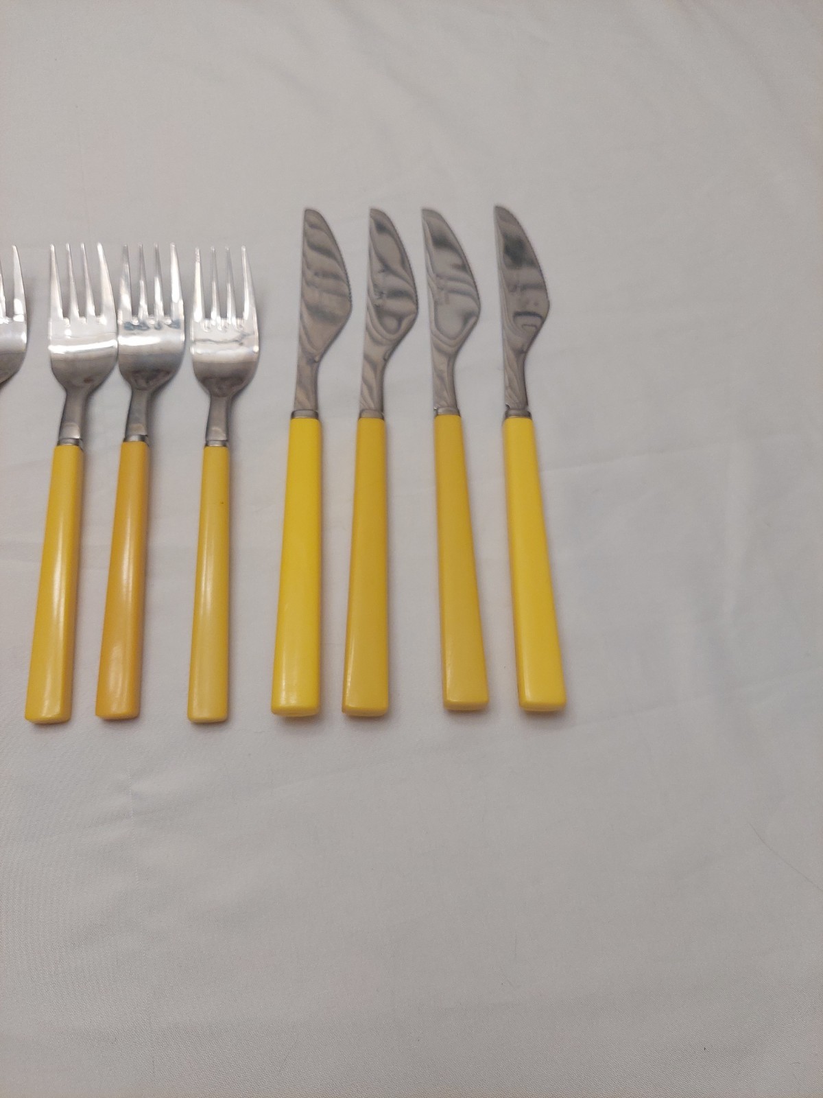 Vintage 16 Piece Anacapa Yellow Melamine Handle Stainless Flatware