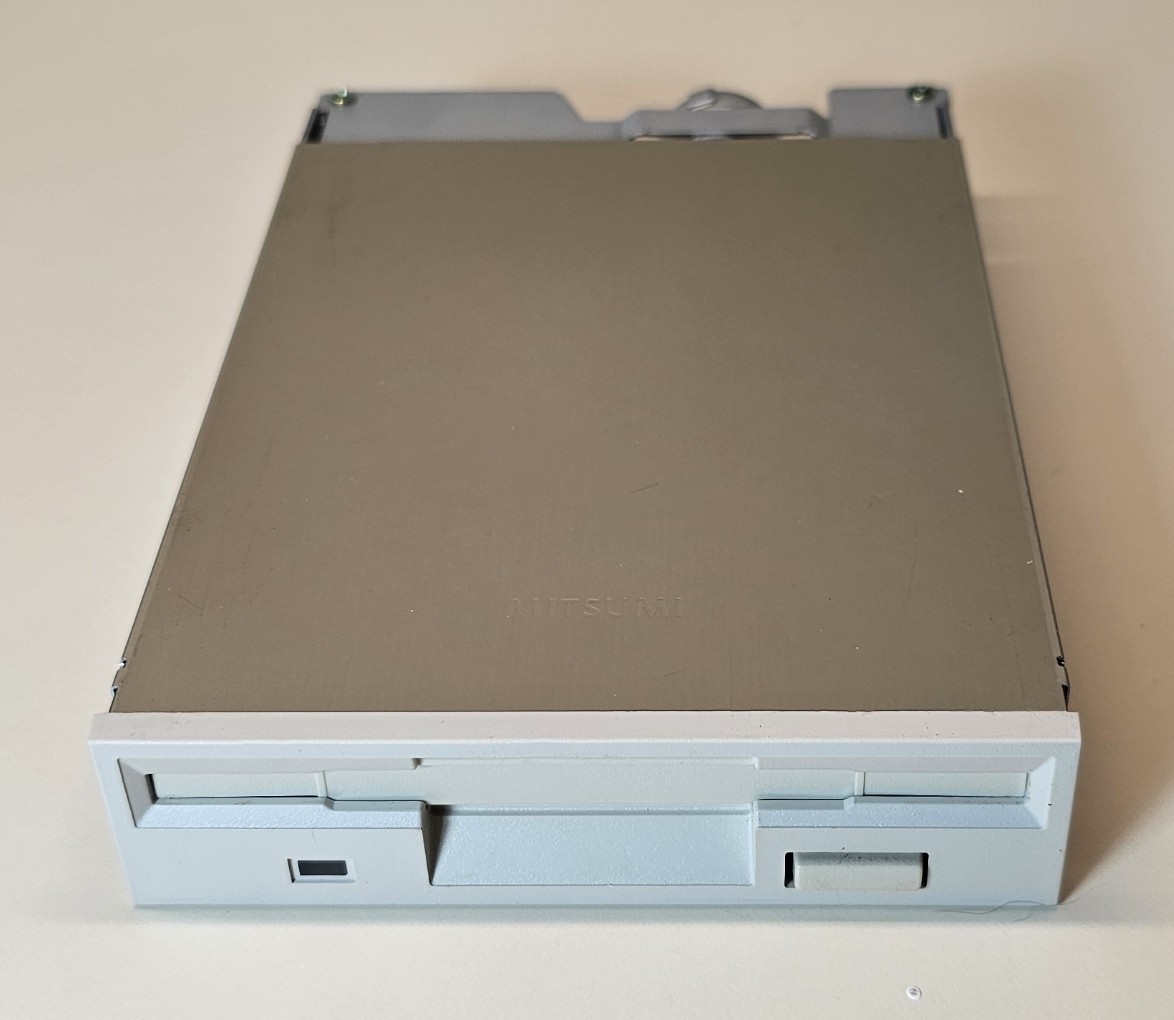 Internal 3.5" Floppy Disk Drive with Cable, Screws - Mitsumi D359T3