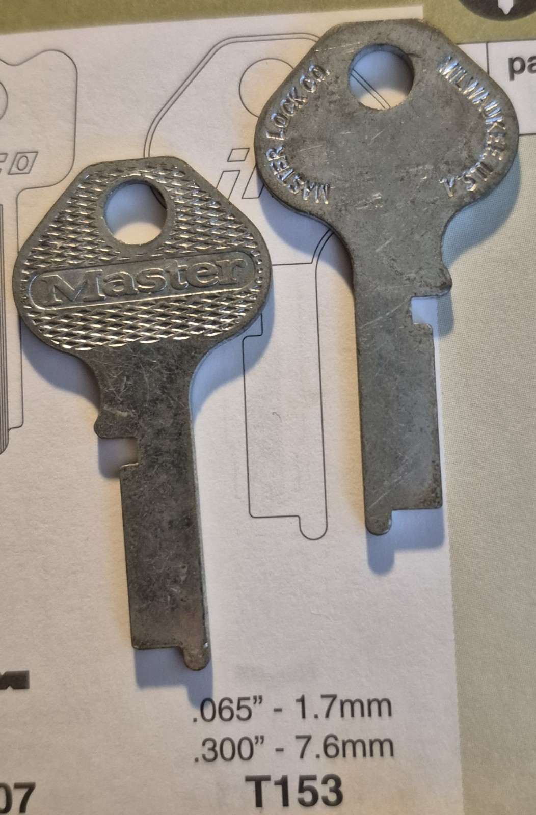 Master Lock NOS/OEM  K1718,  T153, Vintage Flat Steel Key (1) Blank.