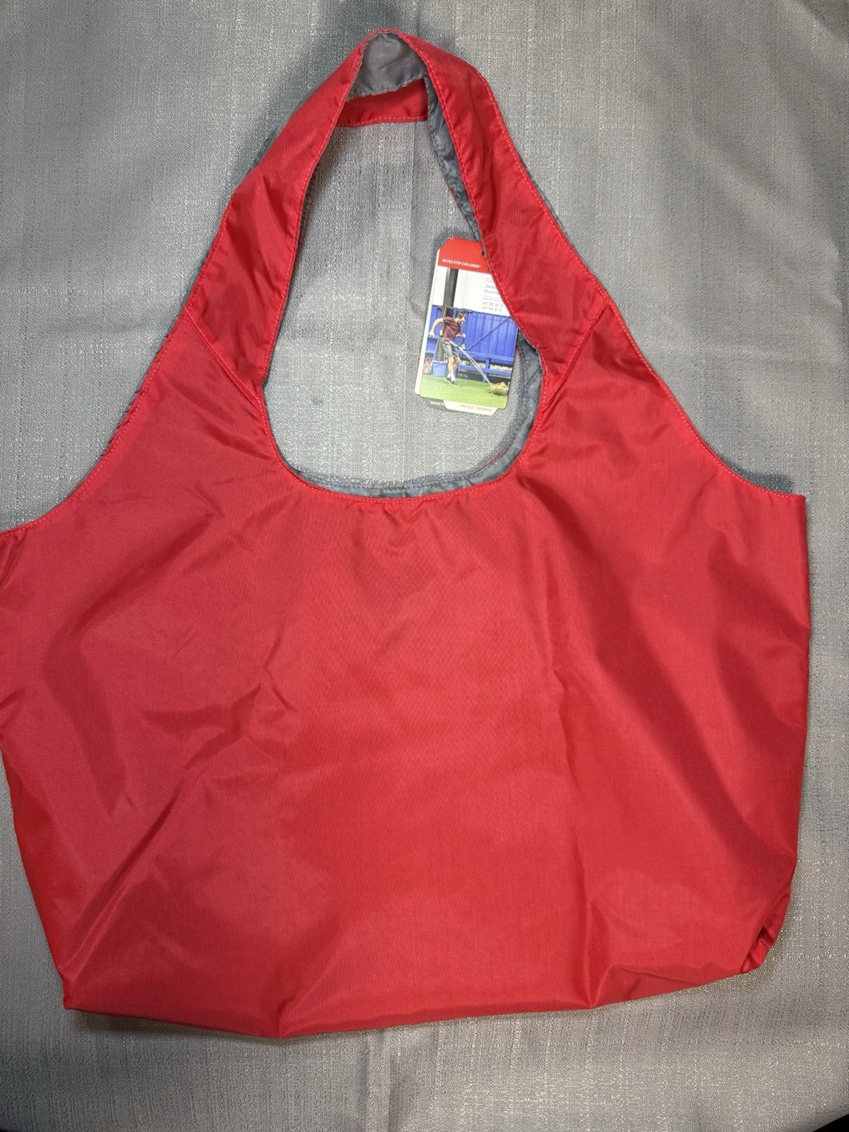 The North Face Mountain Athletics On The Run Bag Red Gray 23L Mesh Pocket