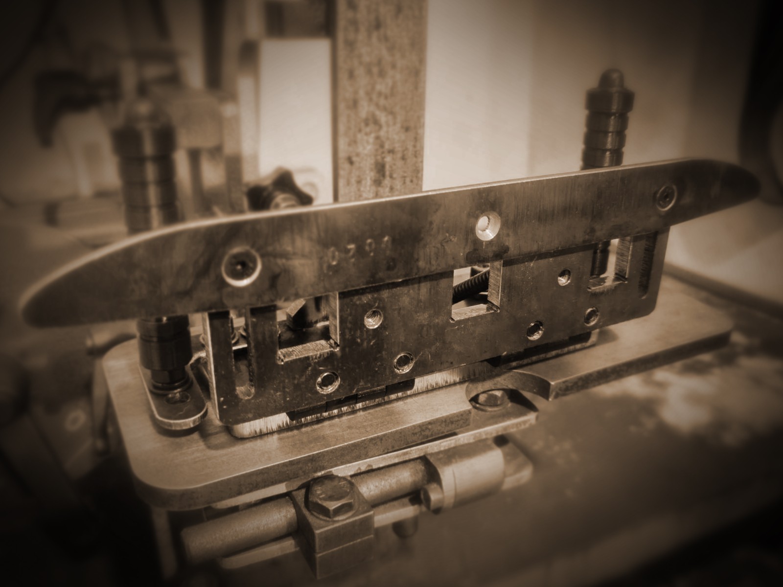 Three position Knife bevel grinding jig.