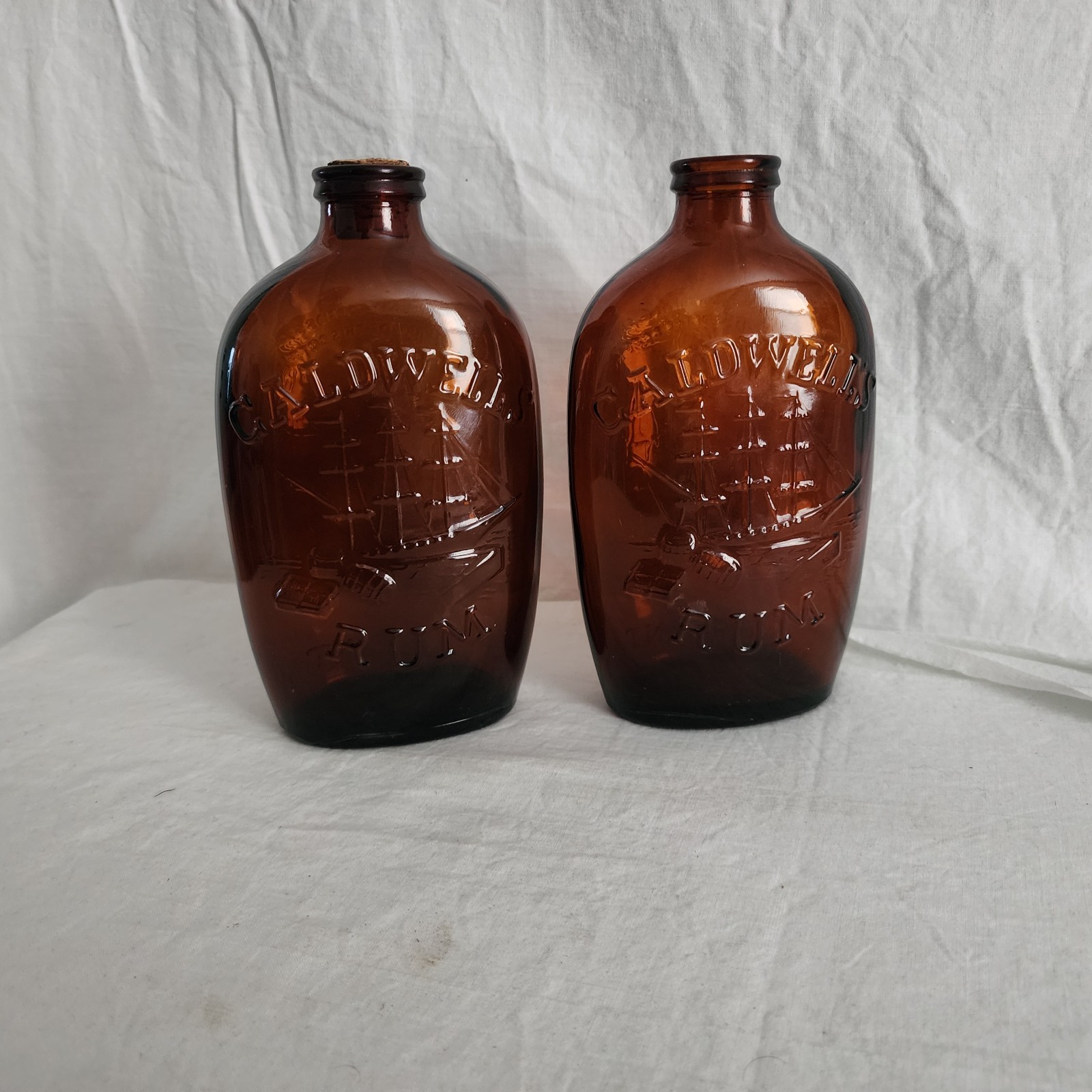 CALDWELL'S  RUM, ONE PINT Empty Bottle's Embossed Clipper Ship Set Of 2