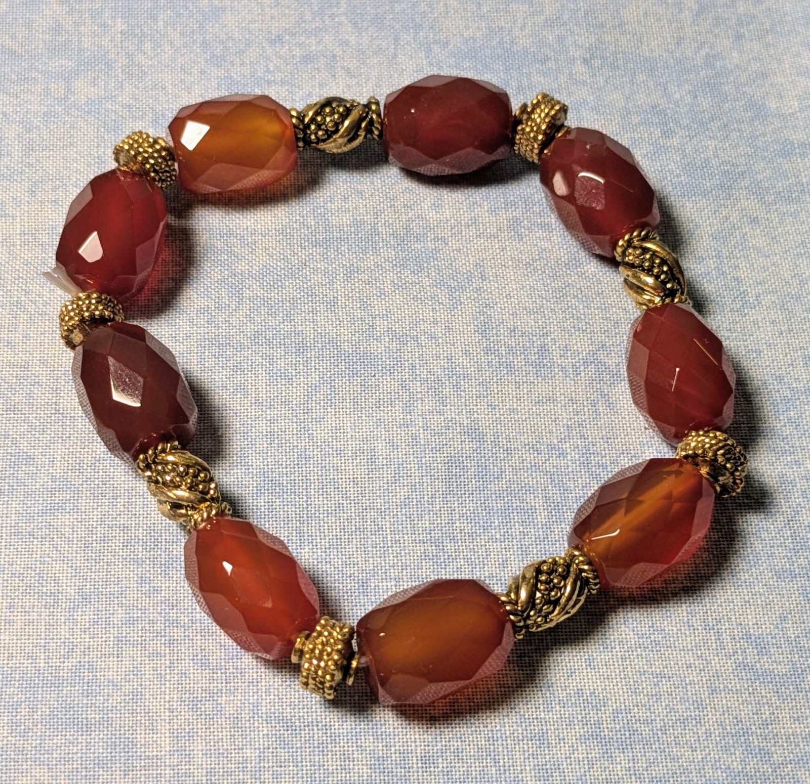 Handmade beaded bracelet 8" Barrel shaped dark orange carnelian beads