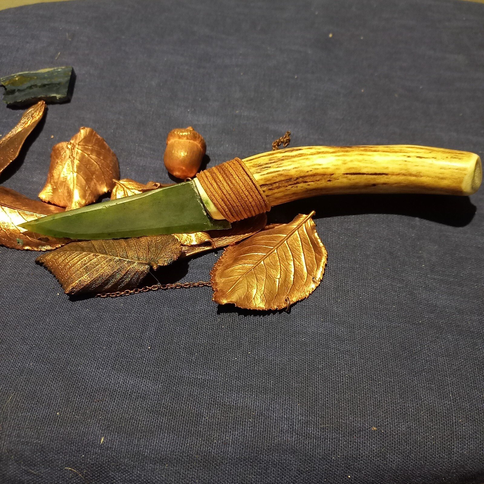 Ritual green jade knife handmade in prehistoric Wiccan pagan shamanistic style