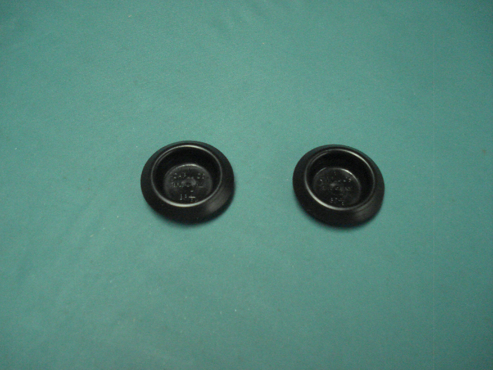 Set of 2 Indented center plastic plugs, 7/8" hole size, auto body, sheet metal