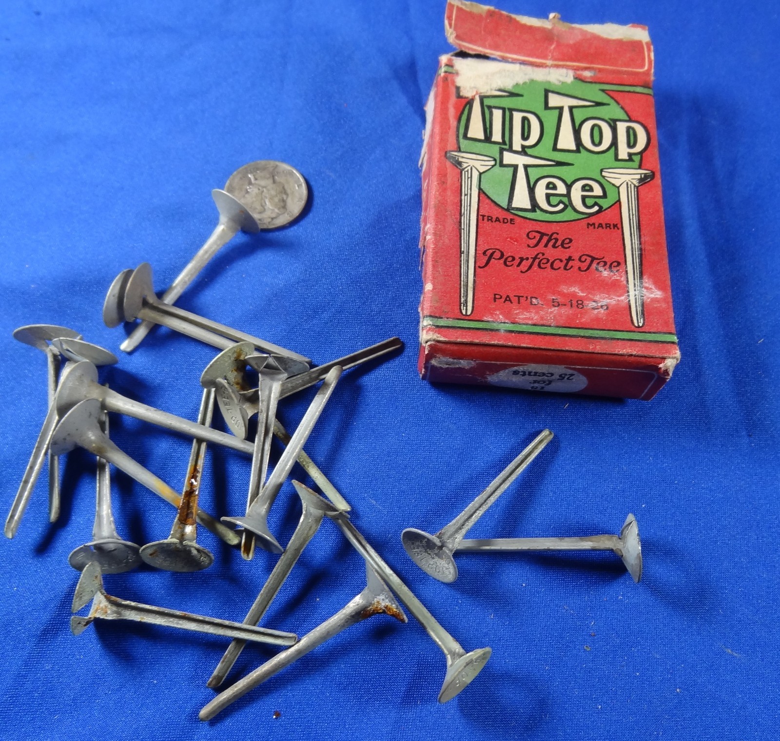 VINTAGE ANTIQUE "TIP TOP " BOX OF ZINC GOLF TEES . GREAT COLLECTABLE
