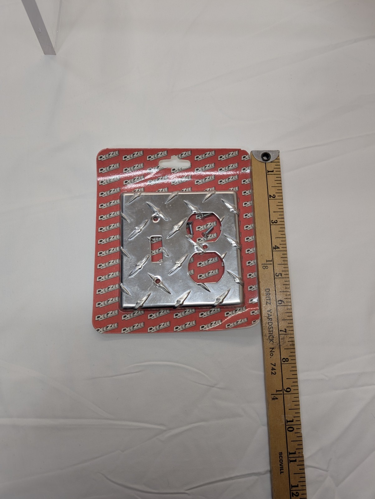 2 PCs DeeZee Brite Tread Outlet Cover. New Unopened Damaged Package