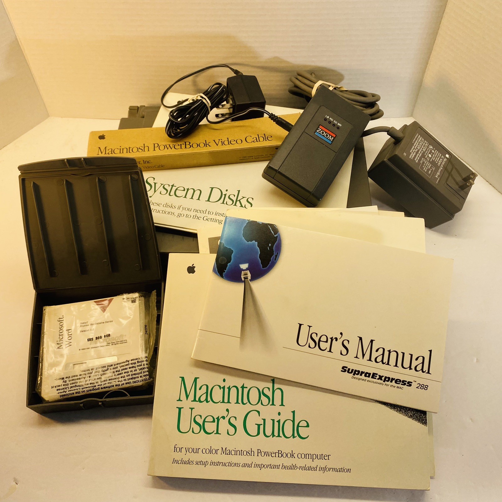 Macintosh PowerBook 180c Bundle- Zoom Modem, Video Cable, Case, Manuals - AS IS