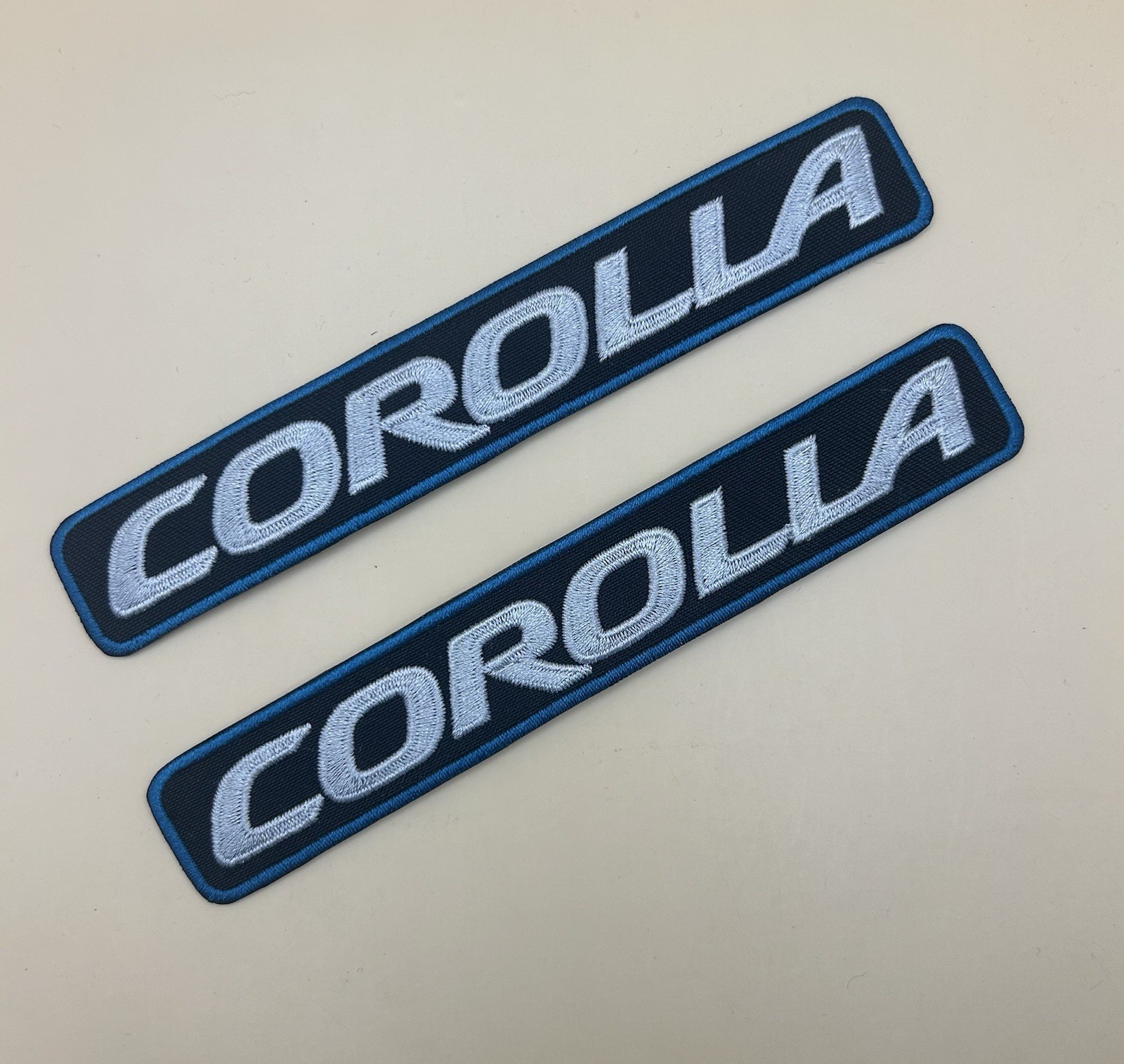 Set of Two (2) Corolla Embroidered Patches 1”x5.5” Toyota Silver Black Turquoise