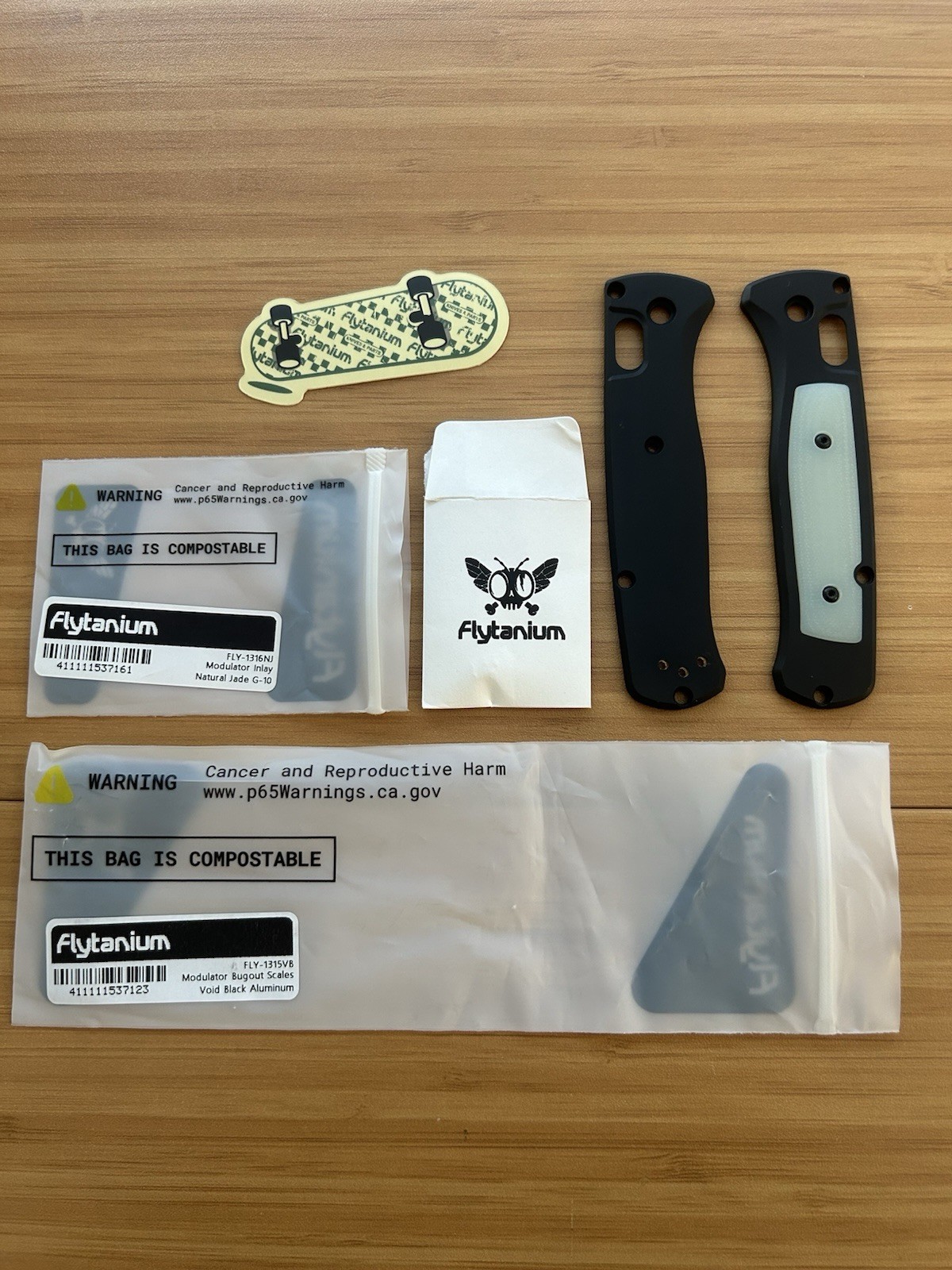 Benchmade Bugout 535 Flytanium Modulator Scales - Void Black Aluminum / Jade G10
