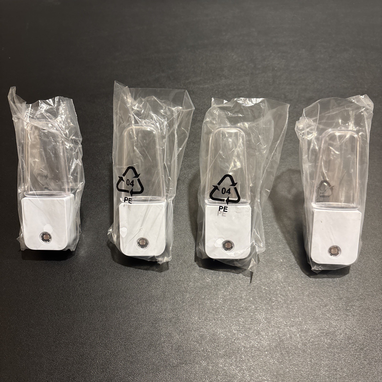 Lot of 4 LED Plug in Night Light, Auto On & Off Sensor  Save $$ Uses Less Power